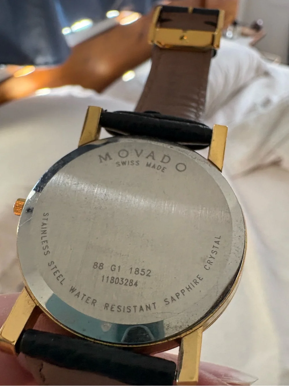 movado Gold Case Black Dial Leather Strap Watch